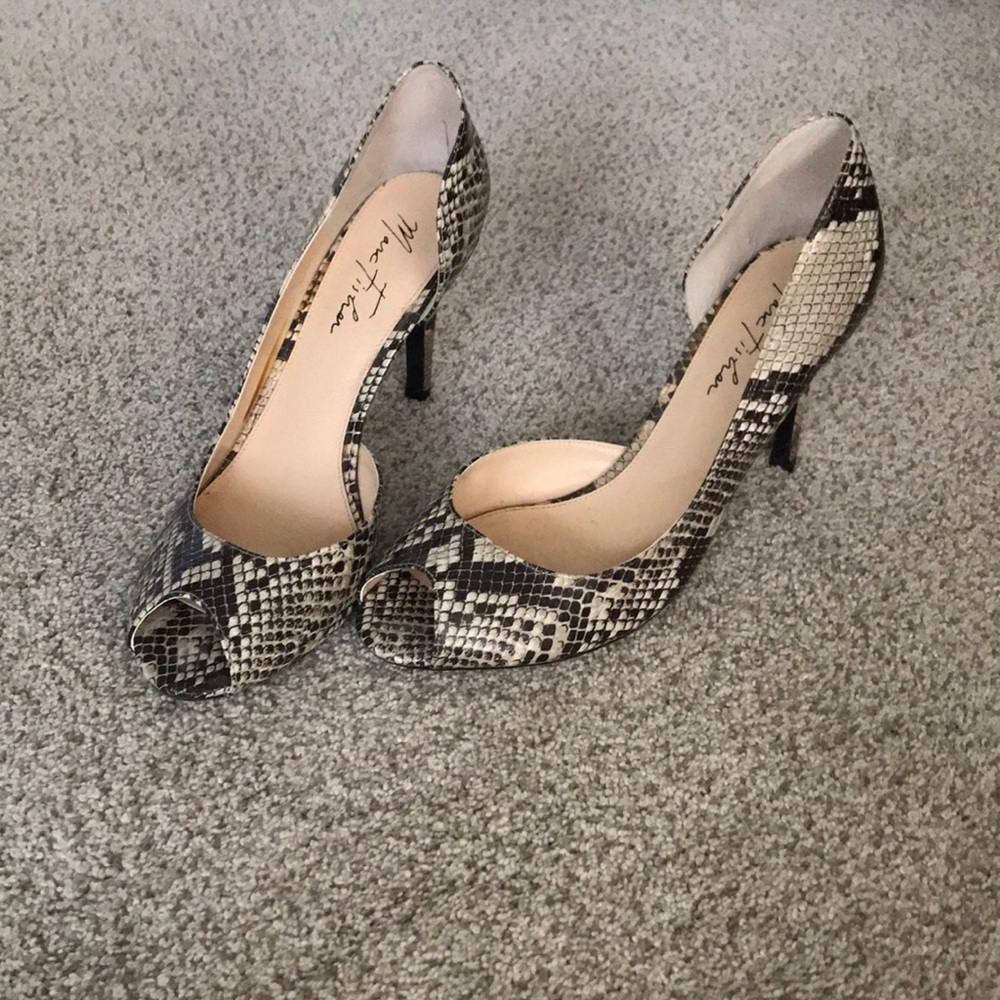 Open toed Marc Fisher snakeskin heels. Gently worn